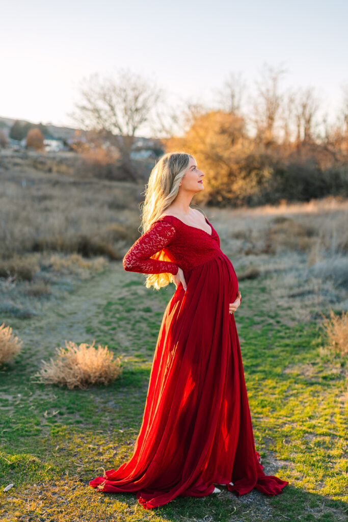 A glowing Anne Marie in a perfect dress, capturing the anticipation of welcoming their first baby in February 2024.