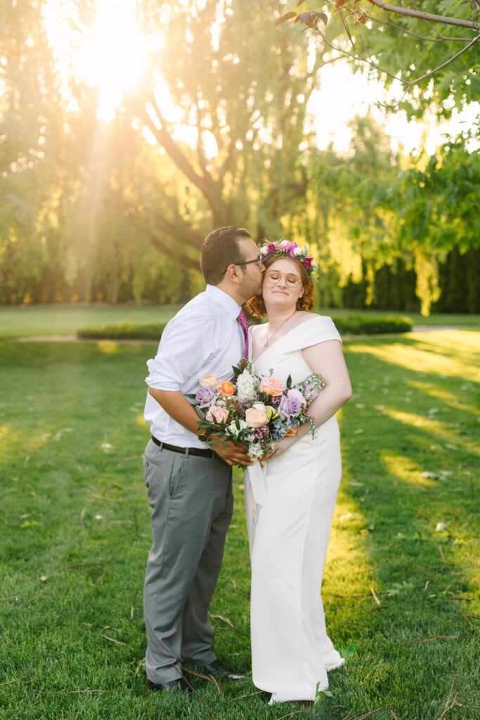 spring wedding at Promise Garden, featuring blossoming flowers and a refreshing ambiance.
